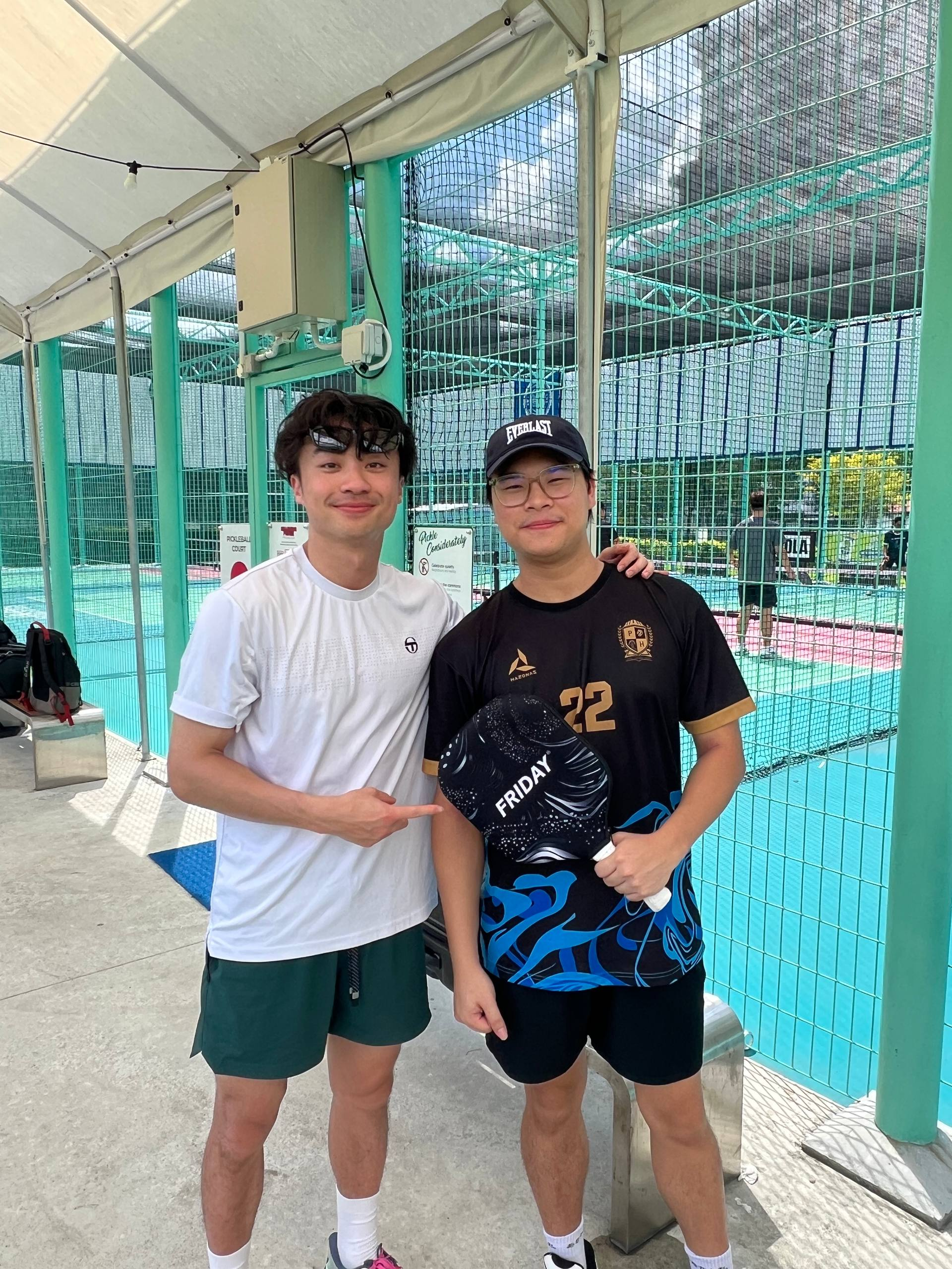 Pickleball coach on the right after a community court session in Singapore